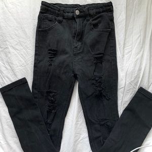 Black distressed skinny jeans
